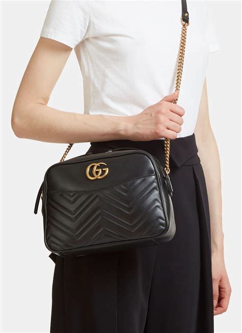 GG Emblem mini shoulder bag in black leather 